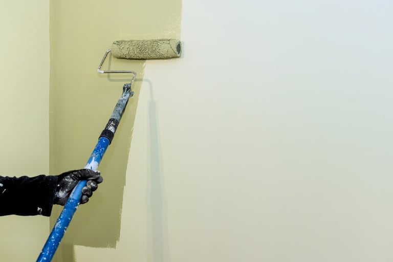 Professional painter working on home renovation project